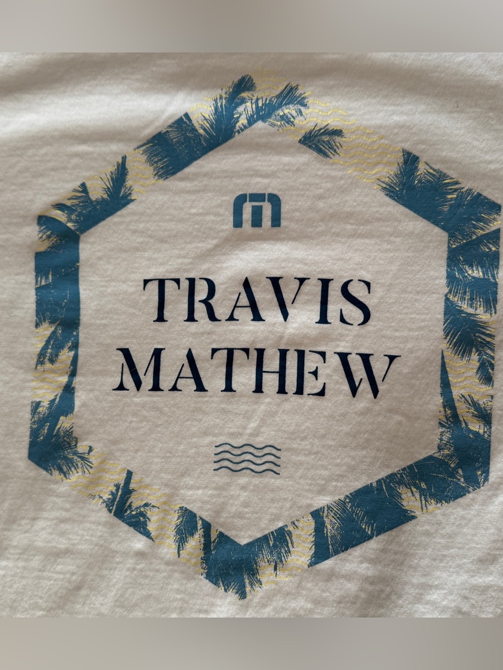 Travis Mathew Tees with blue and white